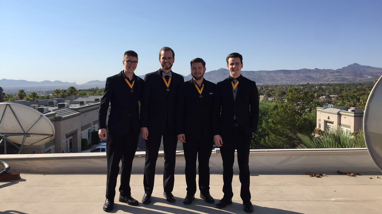 YBQC Third Place medalists Brothers In Arms sing from the the rooftop of Fox5.
